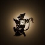 Hanuman shadow lamp casting a large Hanuman ji shadow on the wall at night